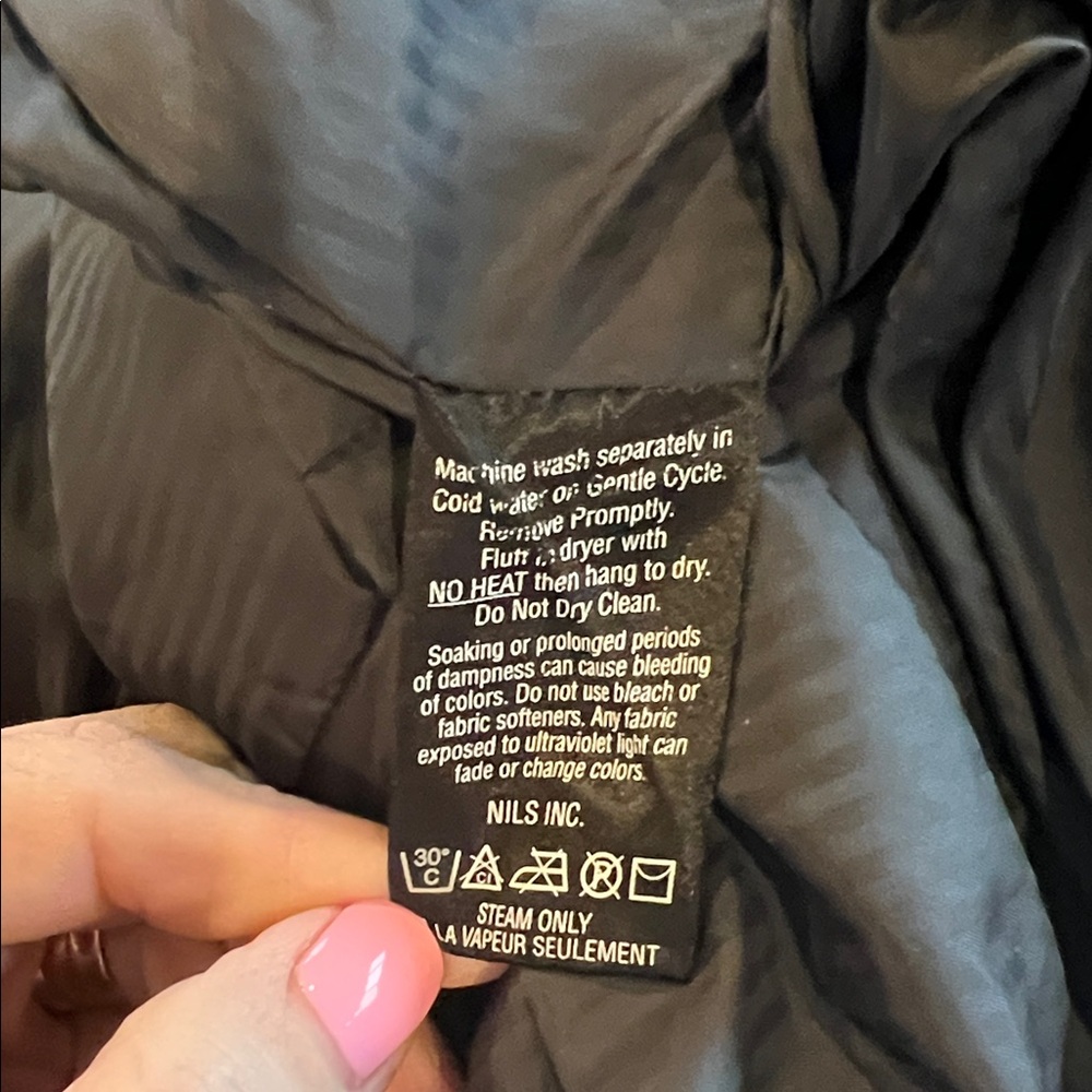 NILS Resort Collection Goose Down Long Puffer Jacket in Midnight Black. - Picture 14 of 14